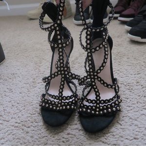 Black heels, gold accents